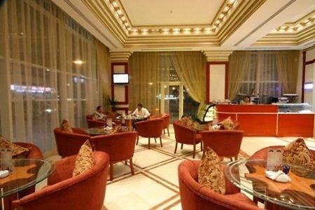 Emirates Palace Hotel Suites Σάρτζα Εστιατόριο φωτογραφία